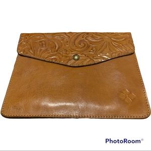 Brown saddle bag, leather embossed